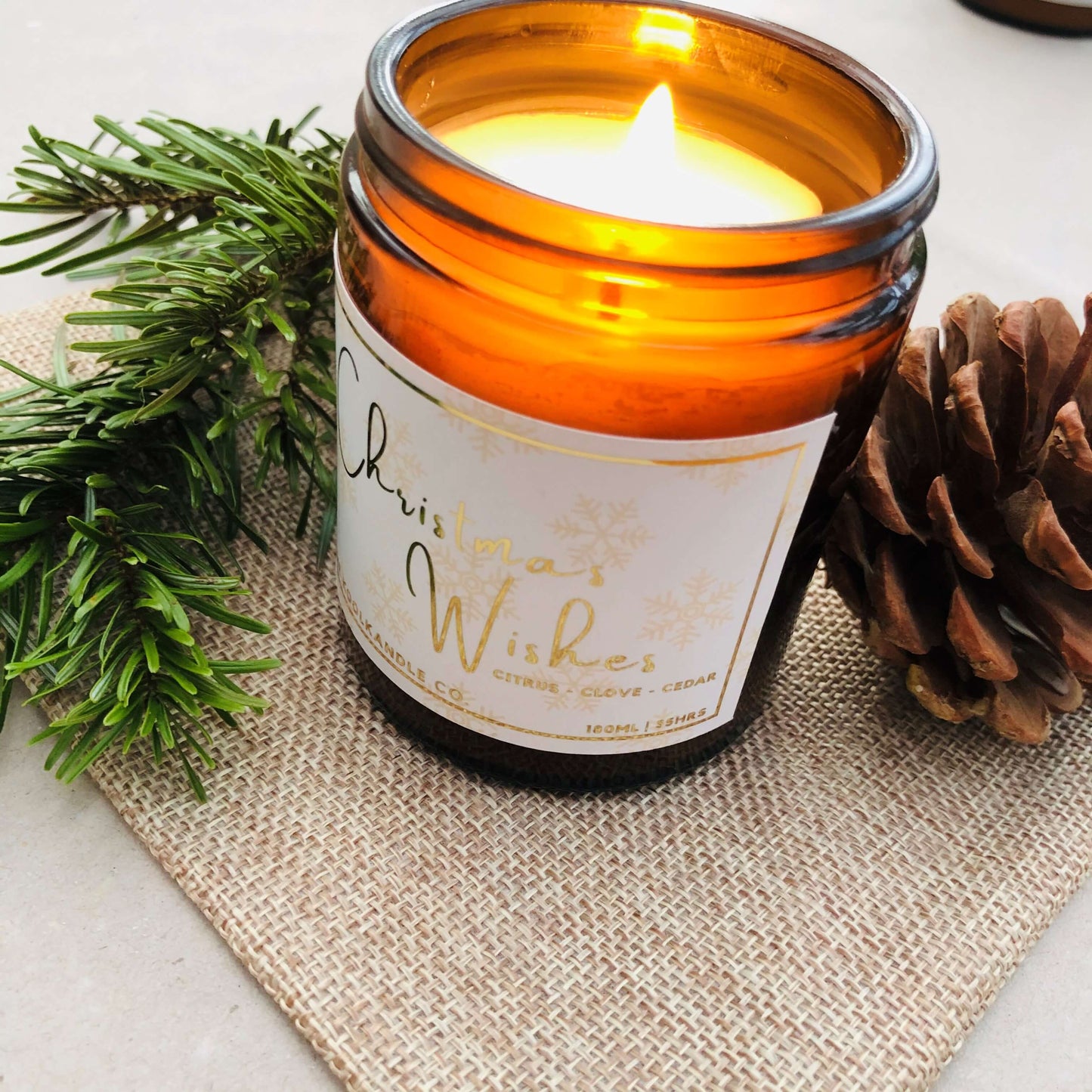Christmas Wishes Candle - Aromatic soy wax and infused with the rich, warming scents of orange, clove, and cedar